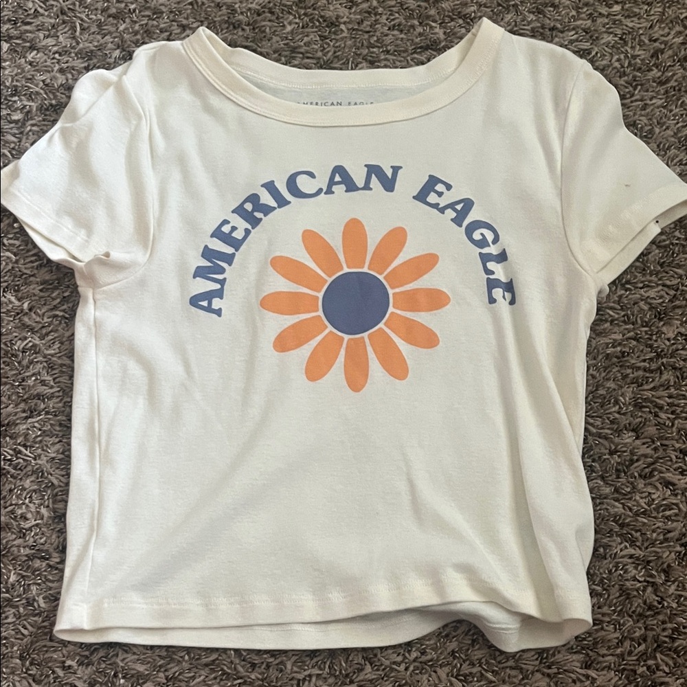 American Eagle Outfitters White Tee with Orange Daisy and Blue Logo